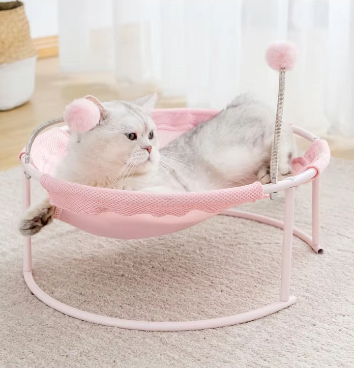 Modern cat hammock & lounger, a comfortable round pet bed with interactive play balls for happy, relaxed cats.