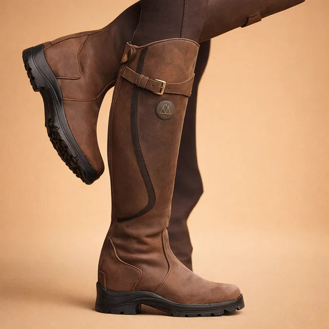 Comfortable women's high boots, perfect for all-day wear, walking, and outdoor adventures.