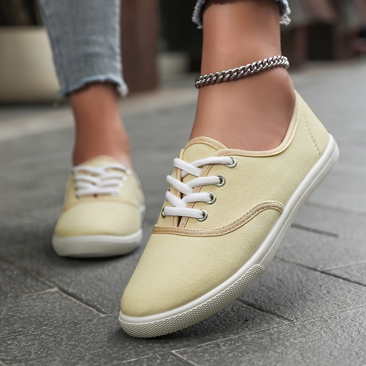 Women's comfortable canvas lace-up shoes, casual low-top sneakers for spring and summer style.