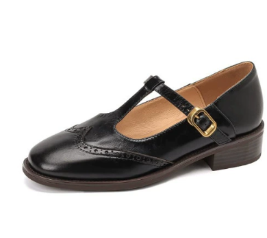 Classic black orthopedic Mary Jane pumps for women, offering comfort and versatile low heel style.