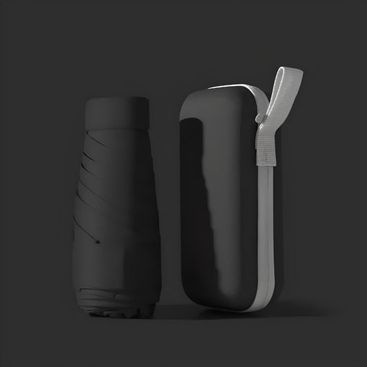 Compact travel umbrella with black canopy and waterproof case, shown folded for portability