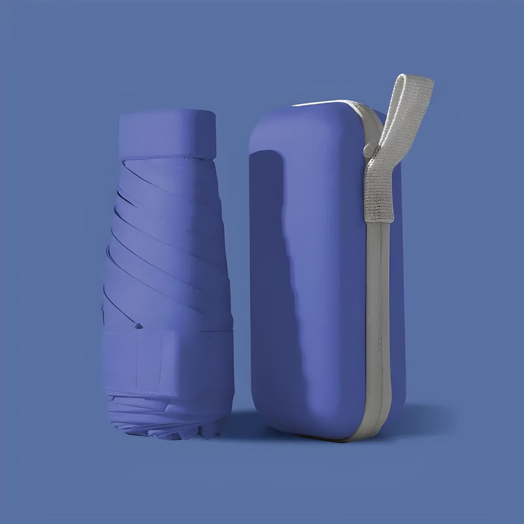 Compact travel umbrella, closed, illustrating its small size for easy storage, with waterproof case