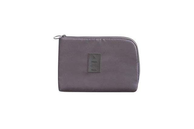 Essential unisex waterproof electronics & cable organizer, a must-have travel accessory.