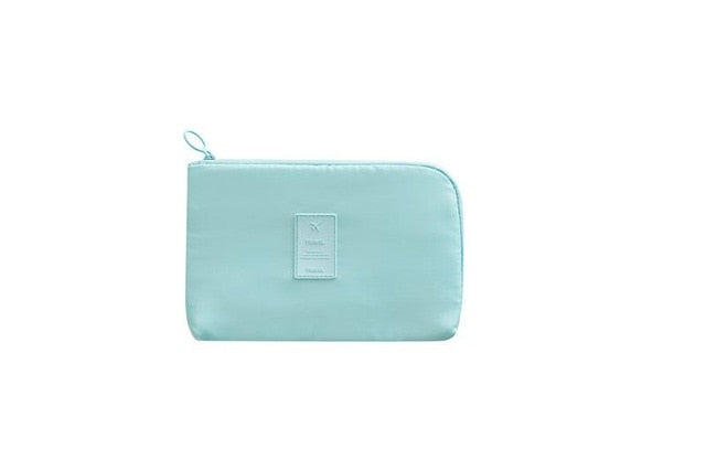 Travel-friendly waterproof tech pouch for cables, chargers & electronics storage.