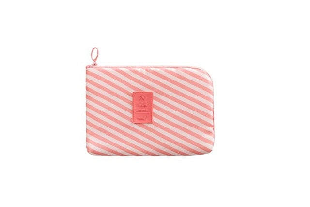 Durable compact waterproof electronics organizer for tangle-free cable management.