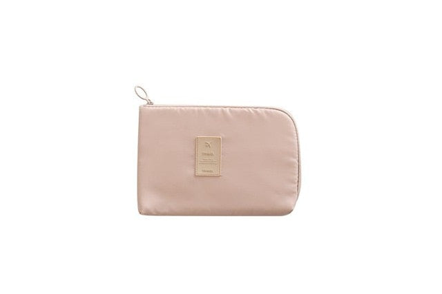 Waterproof electronics organizer & bonus mini storage case for cables, unisex design.