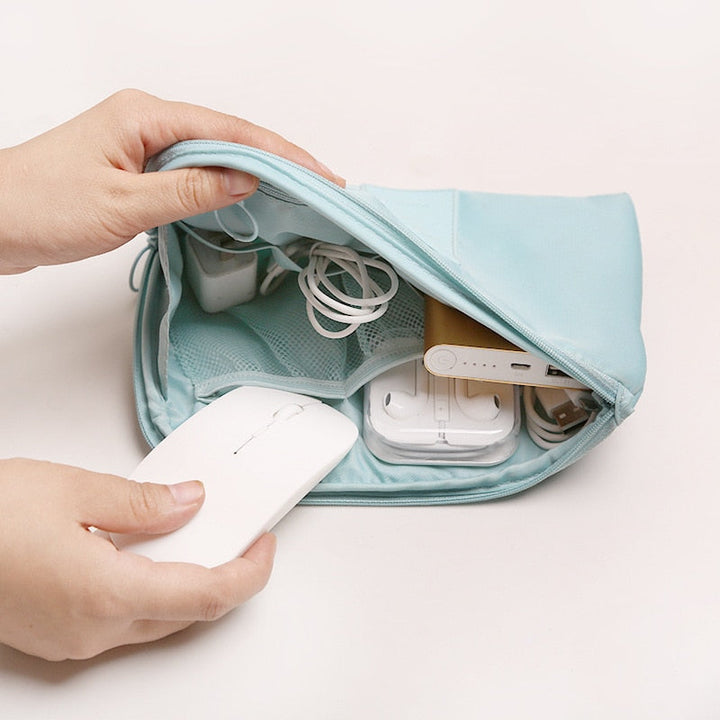 Versatile unisex waterproof tech pouch for cables, power banks & travel accessories.