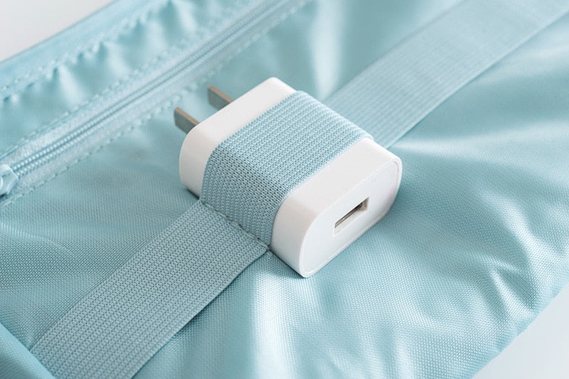 Compact waterproof electronics organizer for efficient cable management & travel.