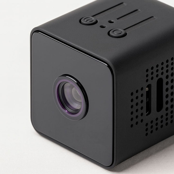 Wireless home security system camera with compact design, night vision, motion detection for complete surveillance.
