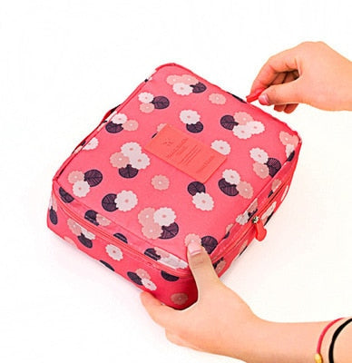Waterproof women's makeup organizer, compact for travel, featuring a flower motif.