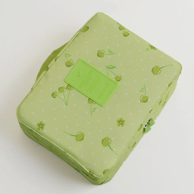 Women's travel makeup organizer, compact, waterproof, and stylishly floral.