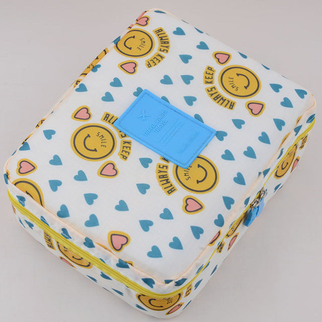 Compact waterproof cosmetic case for women, featuring a beautiful floral pattern.
