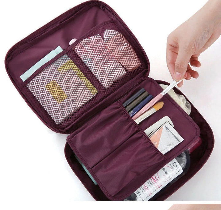 Travel-friendly waterproof makeup storage for women, with a dark blue flower design.