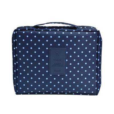 Waterproof travel cosmetic bag for women, designed with elegant dark blue flowers.