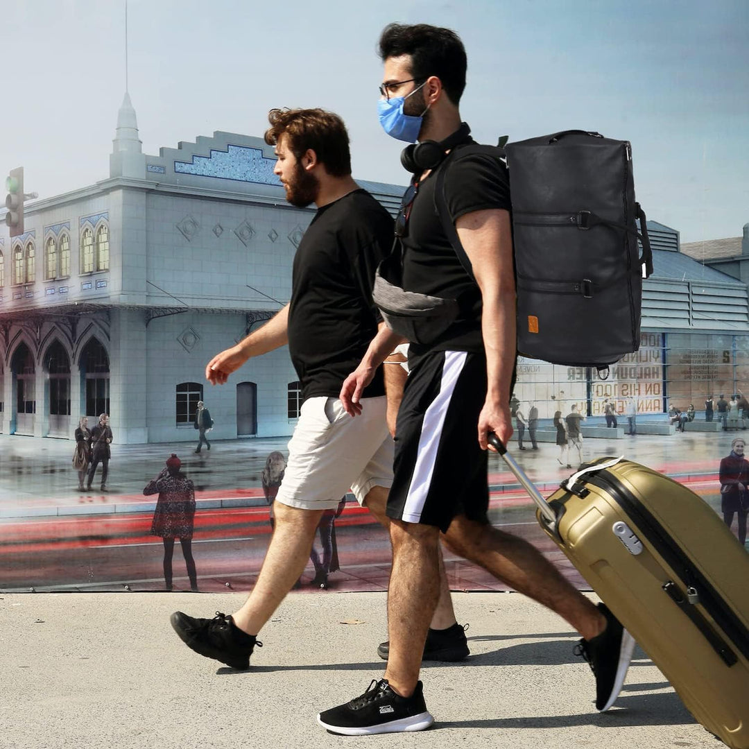 Convertible duffel bag open in hotel room, showcasing easy access to garments & personal items.