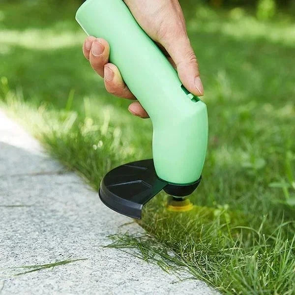 Cordless mini grass trimmer for precise lawn edge maintenance. Lightweight garden tool for effortless yard care.