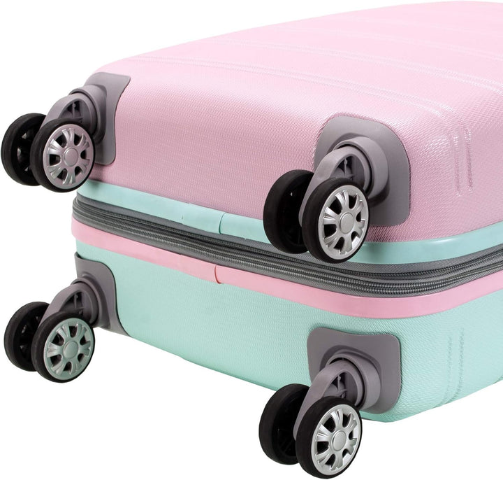 Cotton Candy hardside carry-on luggage. Features lightweight design, expandable storage, and double spinner wheels.