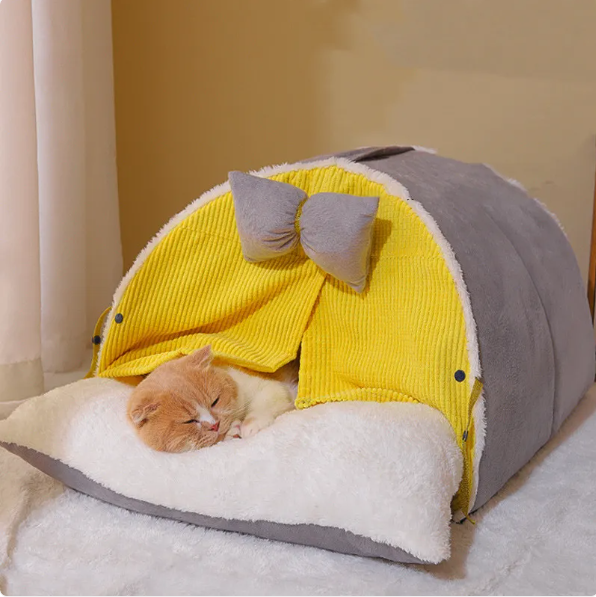 Comfortable arch design cat bed with a cute bow for your pet. Ideal indoor cat house, cozy and washable.