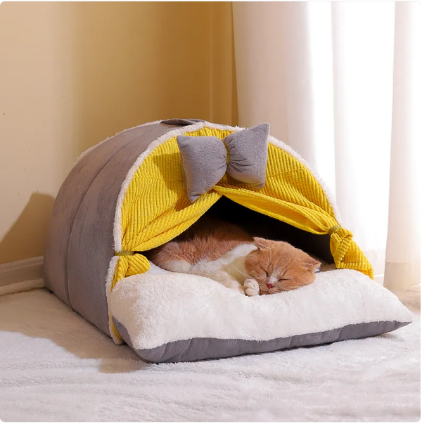 Stylish pet furniture: arch design cat house with a decorative bow. A cozy, washable pet bed for your indoor feline.