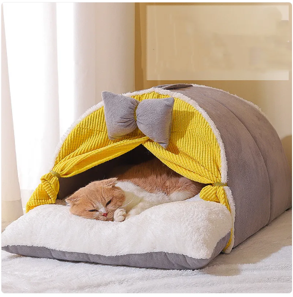 Soft arch design cat bed with an adorable bow. A cozy, washable indoor pet house, perfect cat accessory.