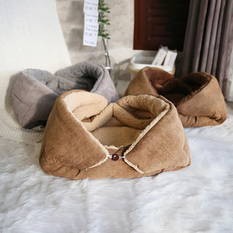 Cozy calming pet bed for small dogs & cats, plush fabric, adjustable shape for ultimate comfort.