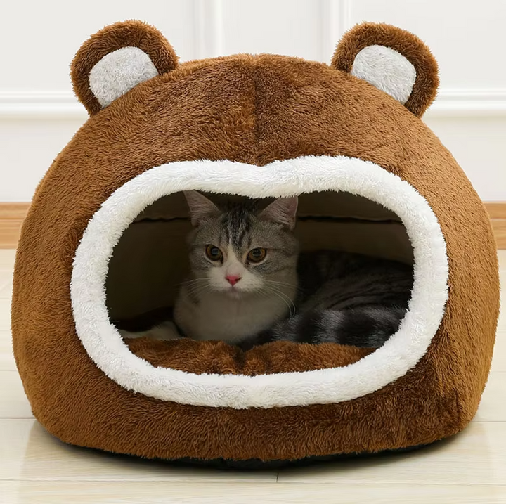 Cozy cat cave bed with plush padding, perfect for secure comfort for kittens and small cats. Non-slip base.