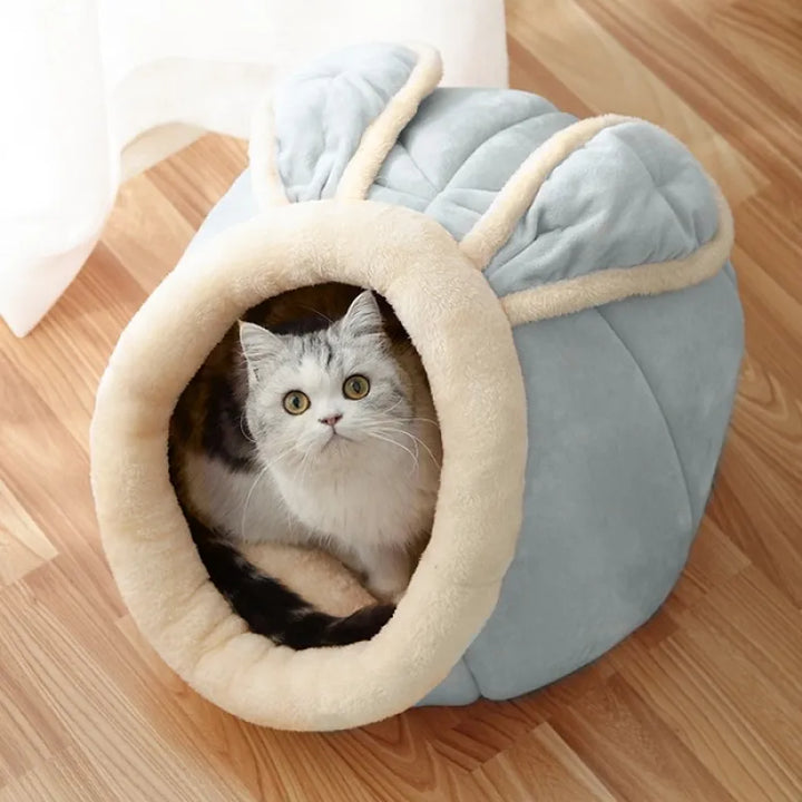 Cozy Cat Cave Pet Bed with cute ear design, soft plush interior for feline comfort & cuddling.