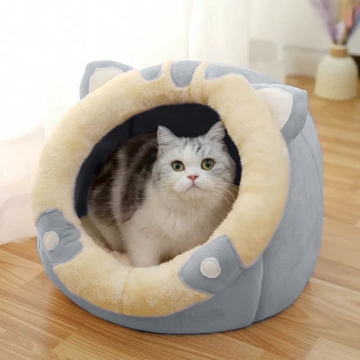 Comfortable Cat House furniture: A soft pet cave bed with unique ear design, perfect for feline naps.