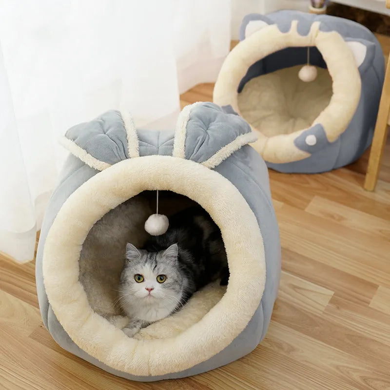 Plush Cat Bed with an adorable ear design. This cozy pet cave provides ultimate comfort for cats.