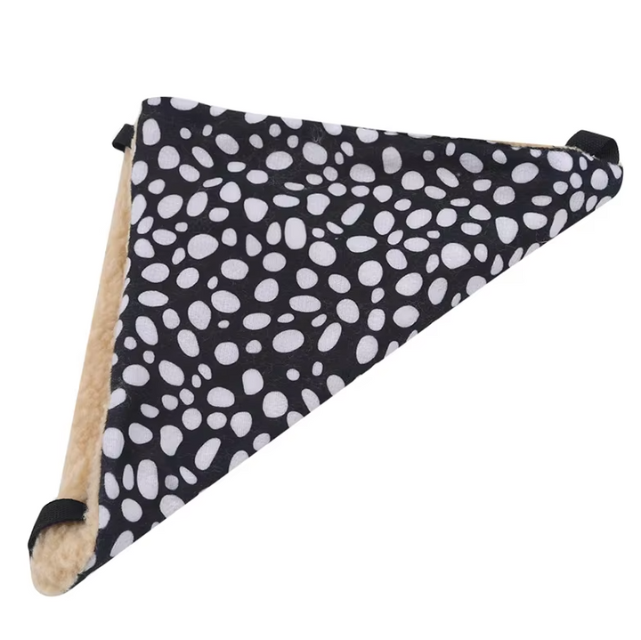 Cozy cat's elevated hammock bed, an ultimate plush resting spot for feline comfort. Space-saving & secure pet bed.