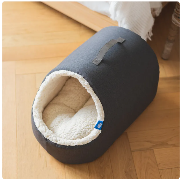 Fluffy cat bed house, a comfy pet supply providing warmth and a secure sleeping spot for your feline friend.
