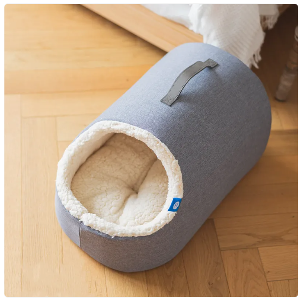 Luxury cat house bed, a cozy pet comfort item with a fluffy edge for your cat's ultimate sleep experience.