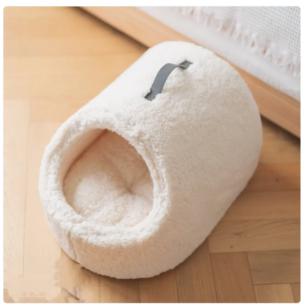 Stylish cat house bed, perfect animal furniture with a fluffy edge for a cozy, private pet sleep zone.