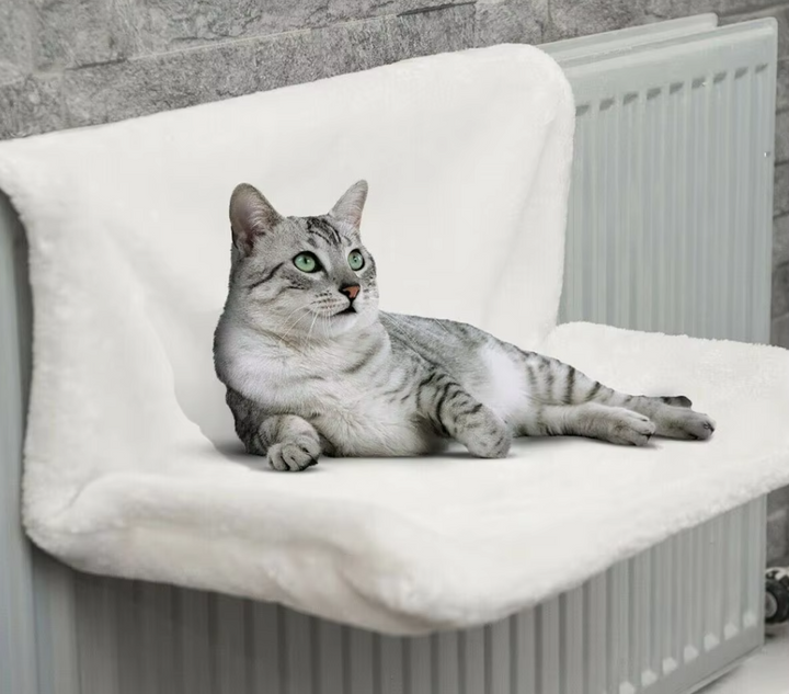 Feline's dream: stable window hammock with a plush cat bed, ideal for sunbathing and enjoying outdoor views.