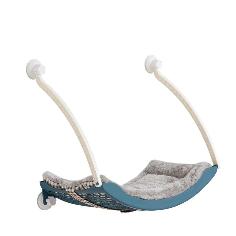 Easy-install cat window hammock, a comfortable suction cup pet bed for indoor cats.