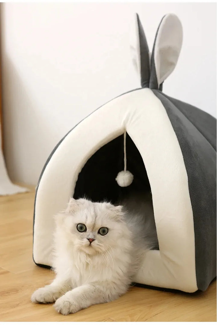 Warm, soft feline pet bed & secure cat cave; perfect for rest & play with a built-in ball.