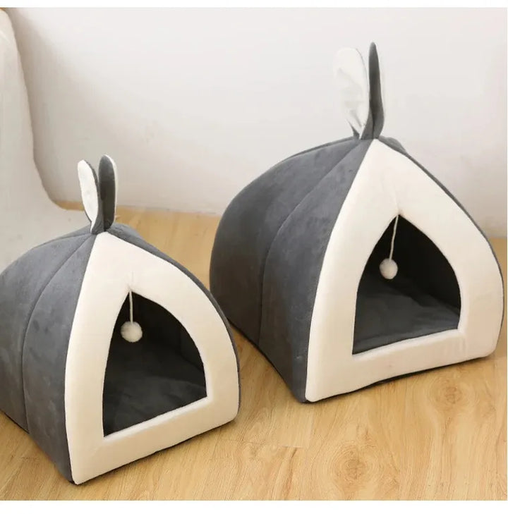 Gray cat bed cave with a playful integrated ball; a cozy haven for small to large cats.