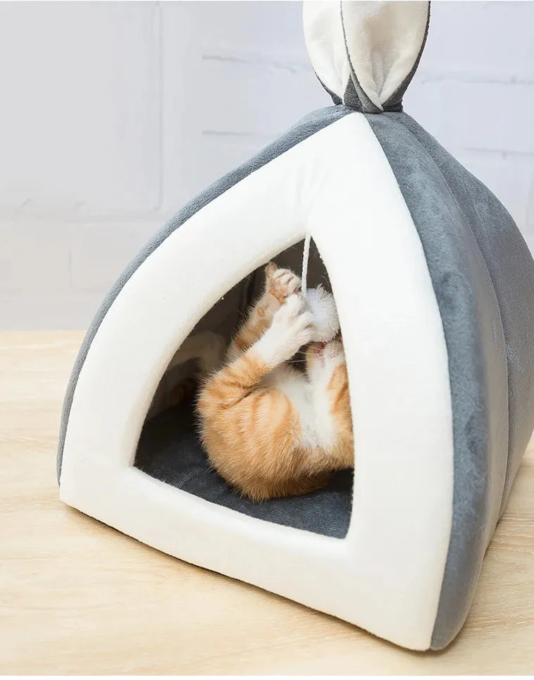 Rosa cat bed & pet cave, washable for easy care, with a fun built-in play ball.