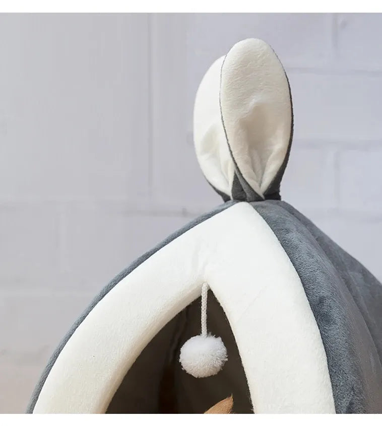 Plush cat cave pet bed, offering a secure, cozy space for your feline to relax and play.