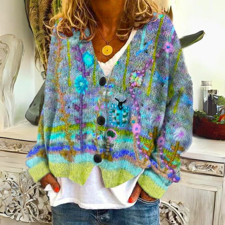 Vibrant women's knitted top, featuring a cozy oversized fit and colorful pattern, perfect for stylish fall fashion.