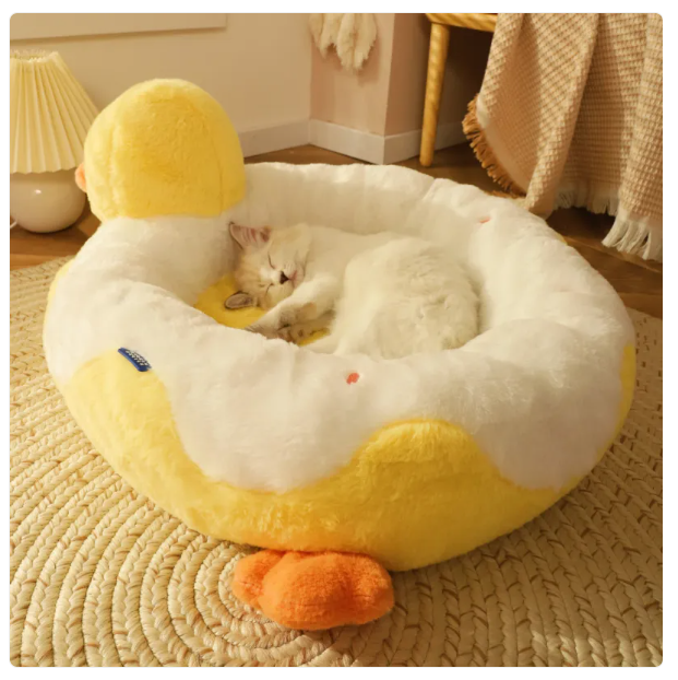 Plush duck cat bed, ideal for relaxation and play. A cozy and washable pet haven.