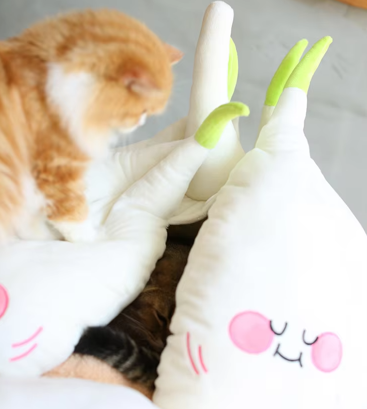 Adorable white garlic cat cave bed, plush and cozy, offering a comfortable pet sanctuary for small pets.