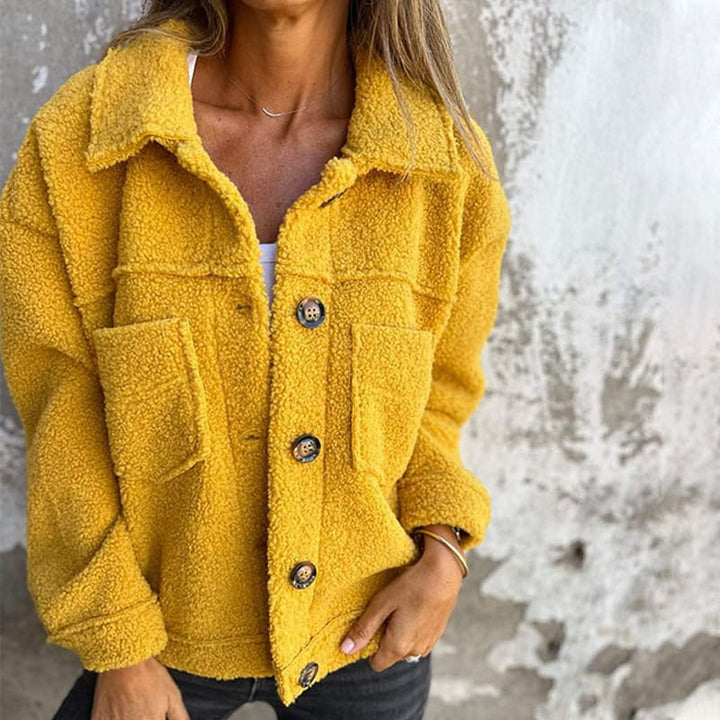 Relaxed fit yellow women's everyday jacket, cozy and stylish hip-length outerwear for women.