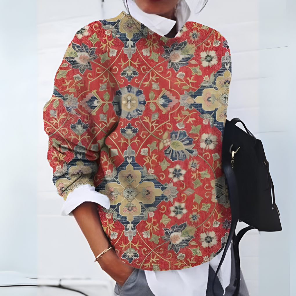 Soft women's long sleeve sweater made from cozy acrylic knit material.