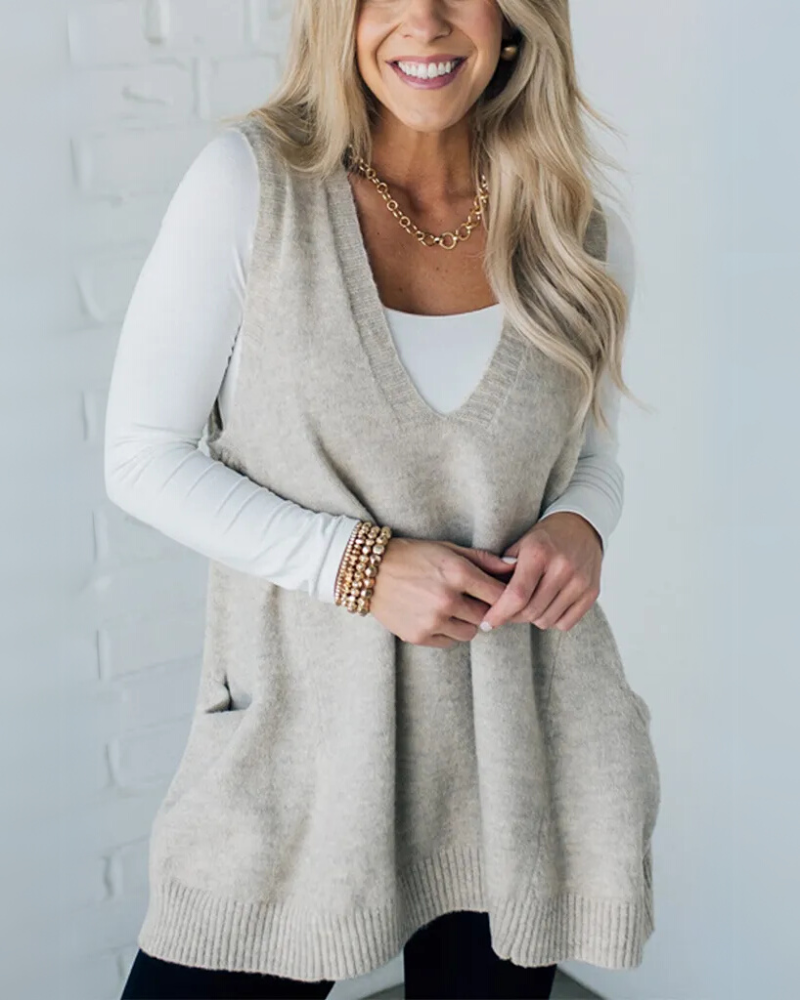 Close-up of the textured knit fabric on a cozy women's vest with pockets