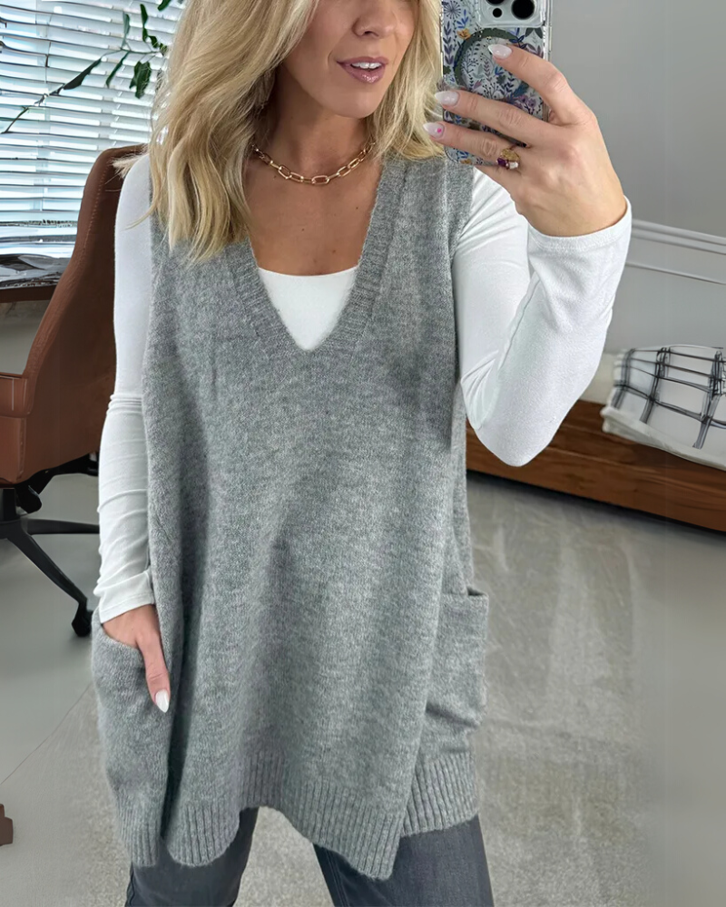 Model wearing a comfortable women's knit vest with pockets, chic layering