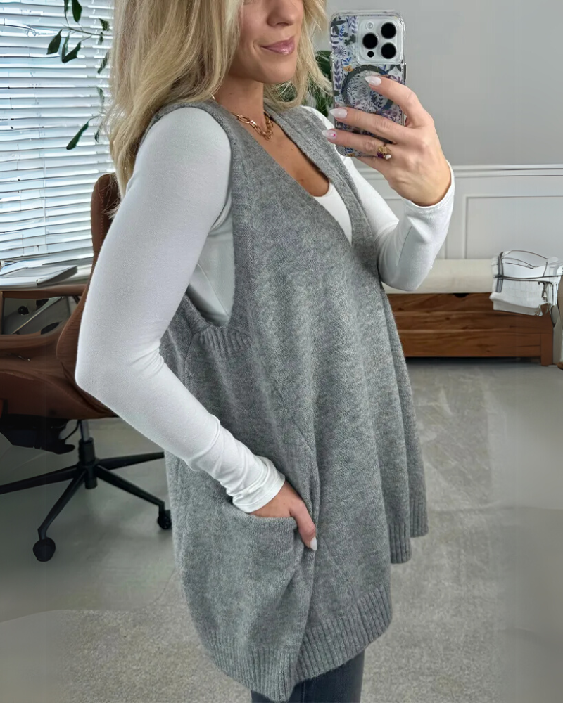 Warm, cozy women's knit vest with spacious pockets, versatile sleeveless jacket