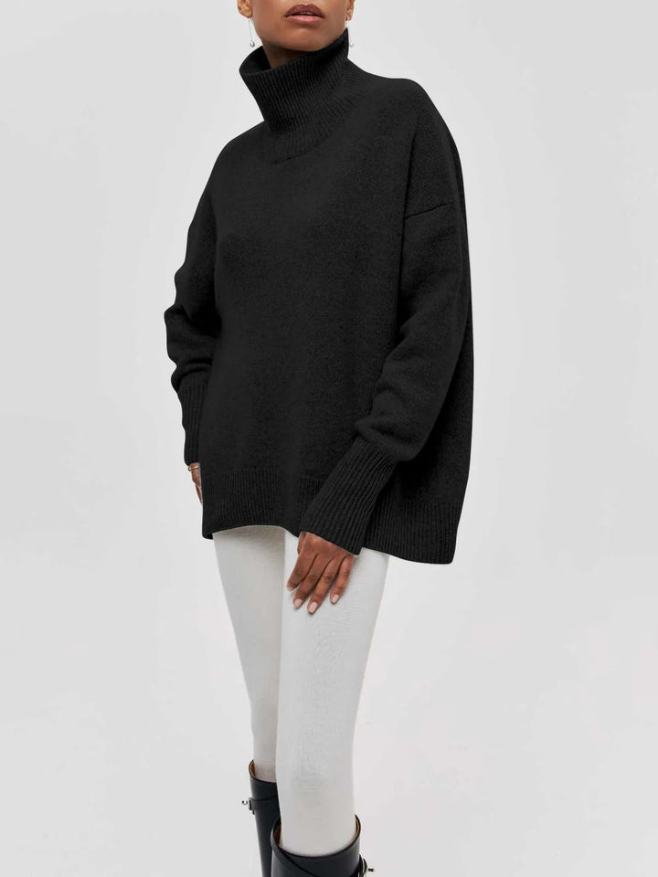 Soft knit women's oversized turtleneck sweater, embodying comfort and winter style.