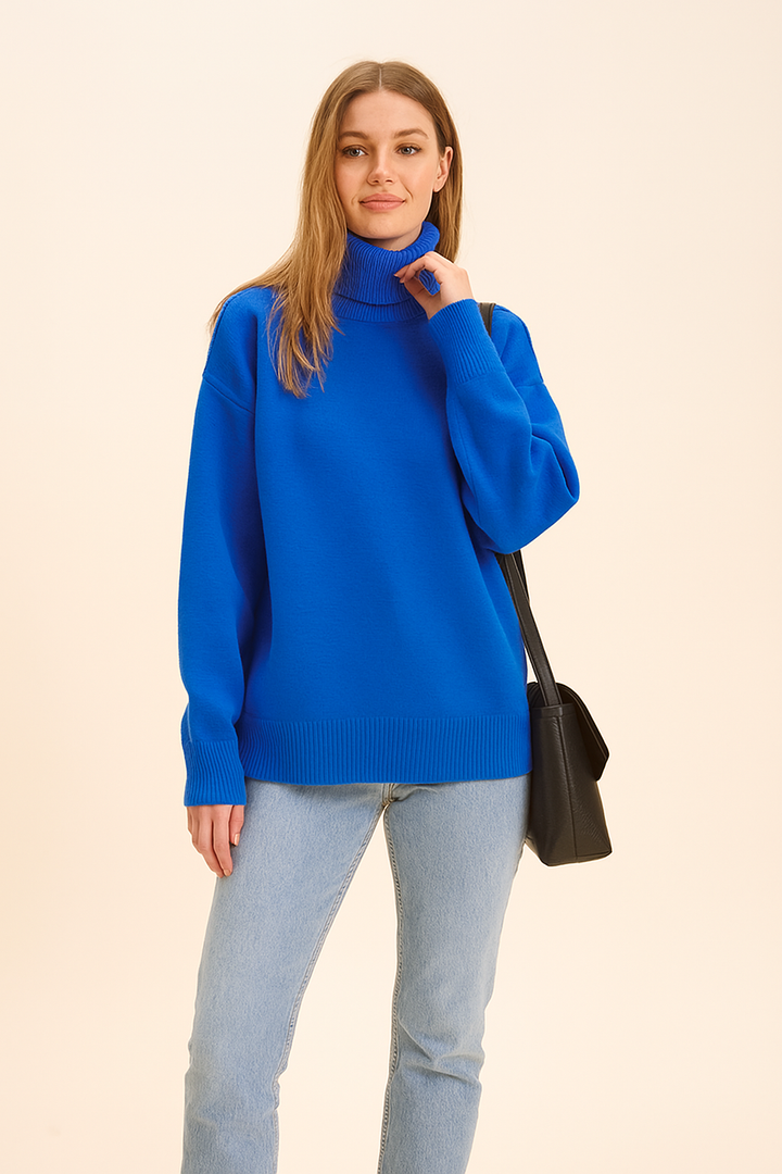 Plush women's loose fit turtleneck sweater, ideal for cozy yet chic winter fashion and comfortable layering.