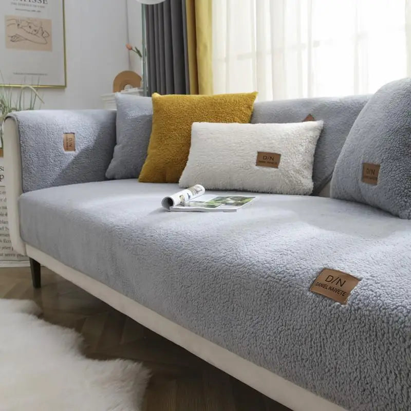 Close-up of soft sherpa fleece sofa cover texture. Waterproof & non-slip design, adding cozy comfort to your living room.